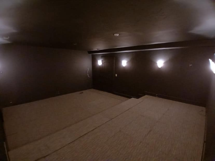 install mid-grade carpet in a theater room