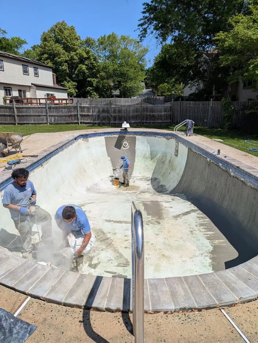 resurface a pool with quartz