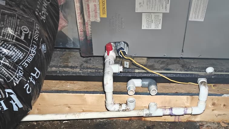 repair a broken pvc ac condensate drain pipe