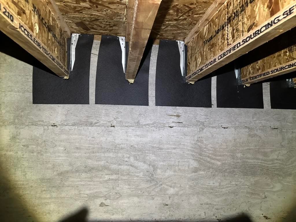 insulate crawlspace walls with fiberglass batts and 1-inch spray foam air seal