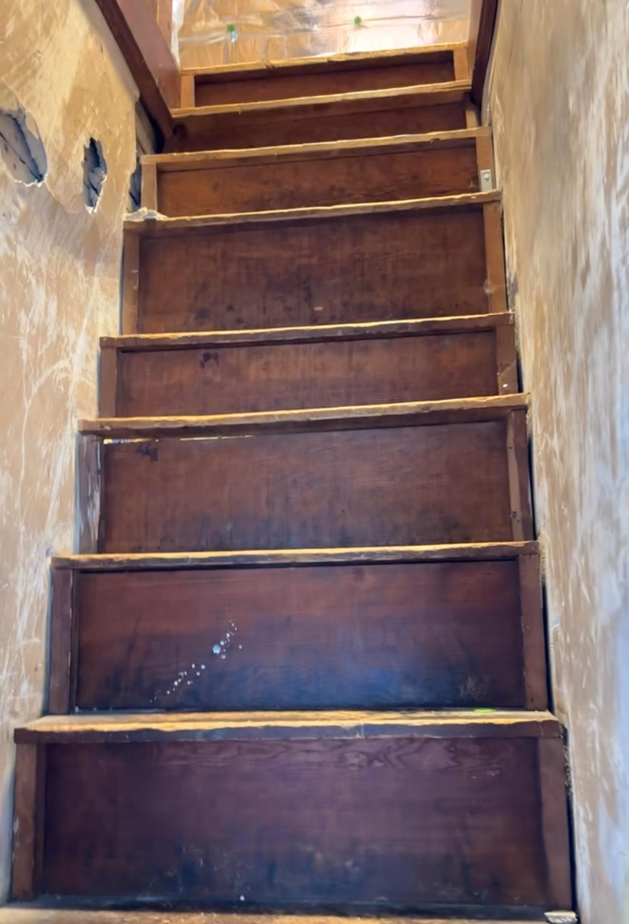 remove a closet staircase, install a pull-down ladder, and create two closets
