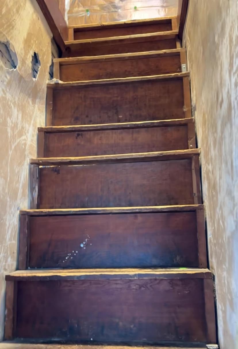remove a closet staircase, install a pull-down ladder, and create two closets