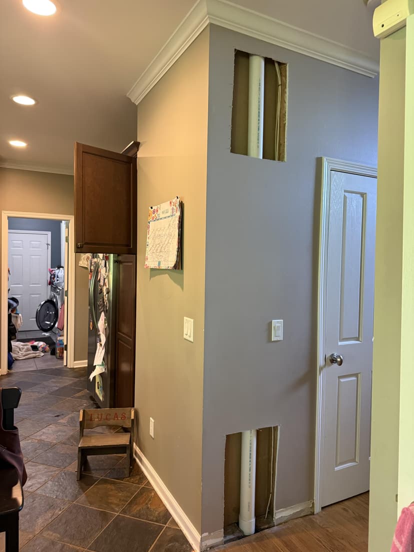 repair large drywall holes, paint, and install trim