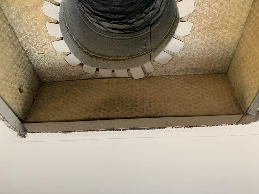 encapsulate fiberglass in ductboard boots with mastic