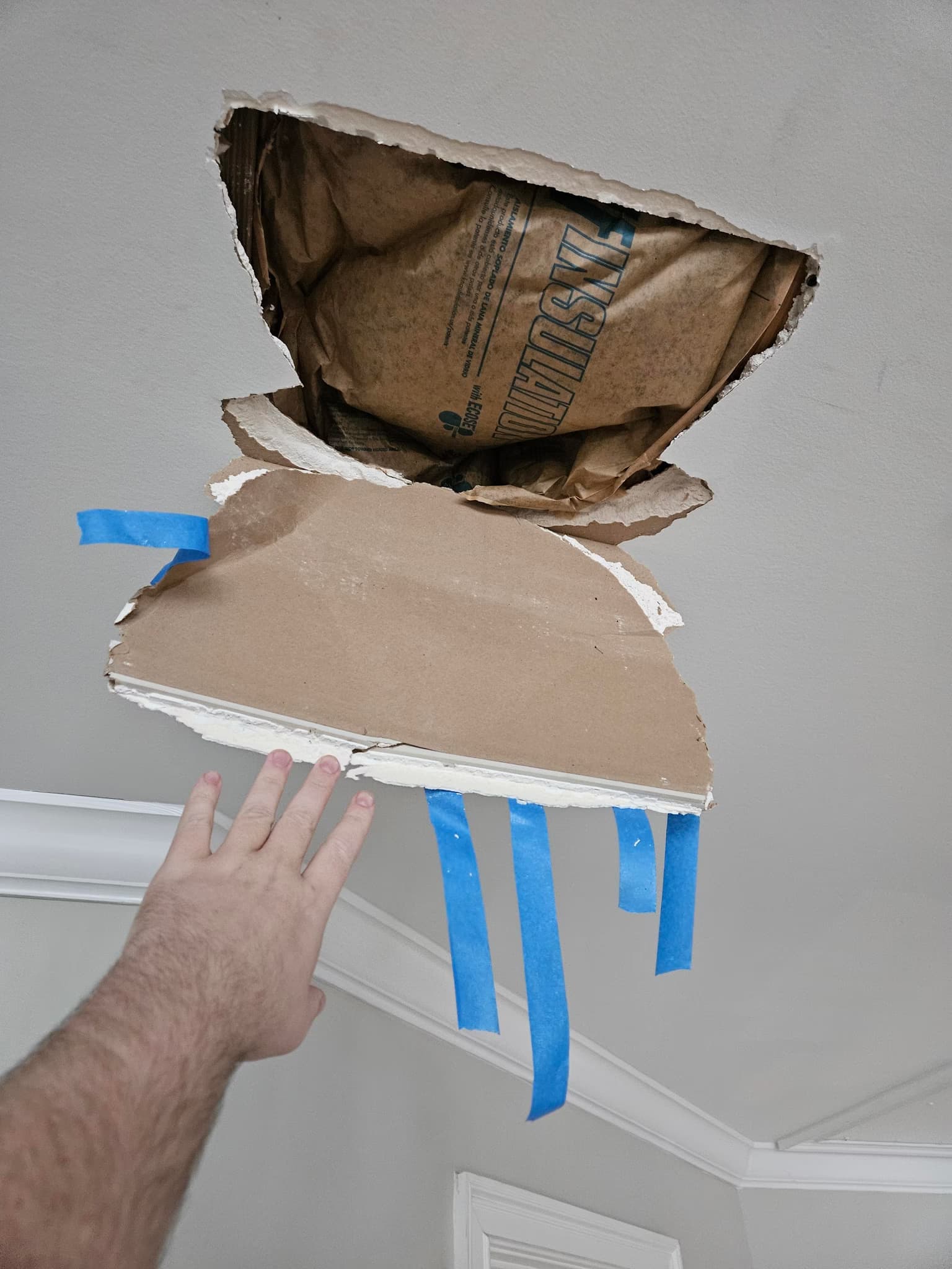 fix a hole in the ceiling over the stairs
