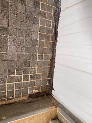 replace a warped and leaking shower door