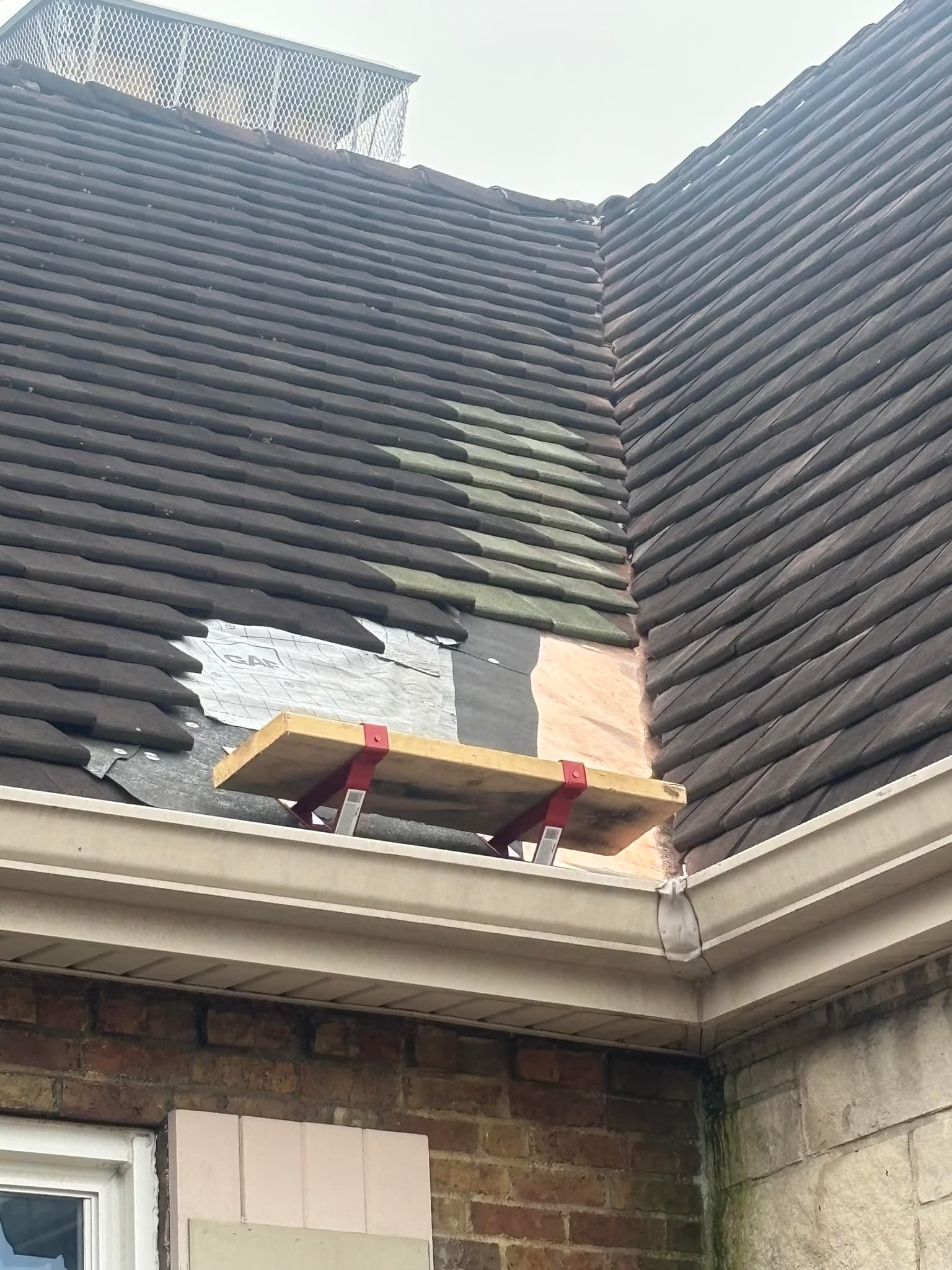 repair a ceramic tile roof valley