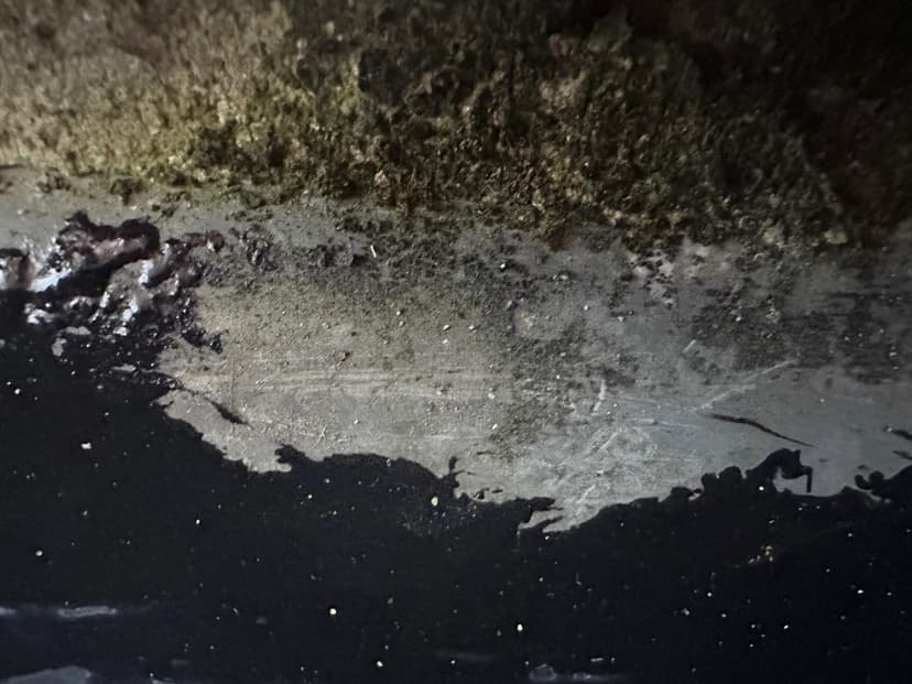 repair a leak around a parapet wall/gutter on a mansard roof