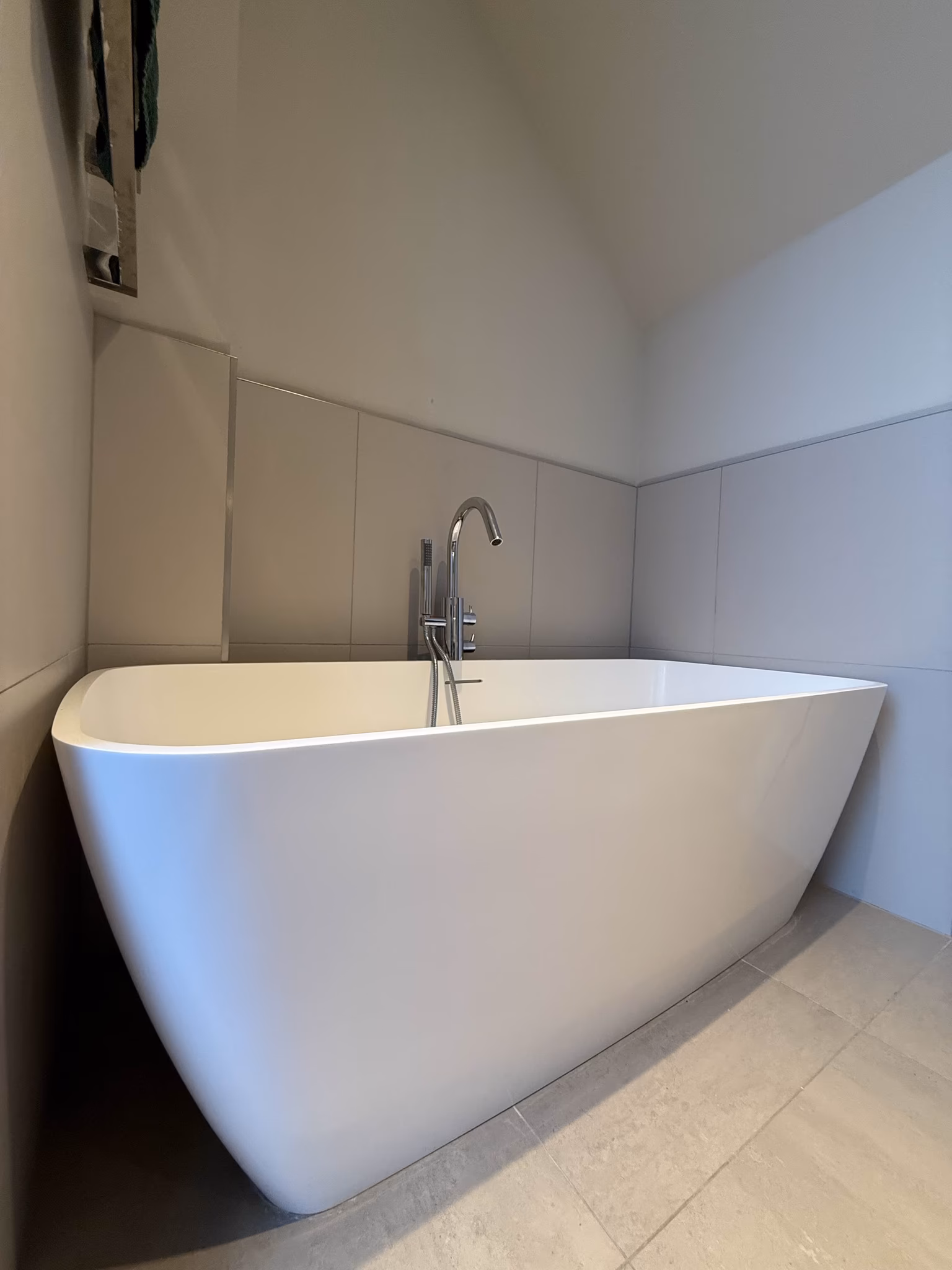 renovate bathroom to replace freestanding bath with fitted bath and add shower