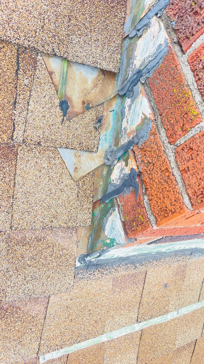 replace flashing and shingles around chimney