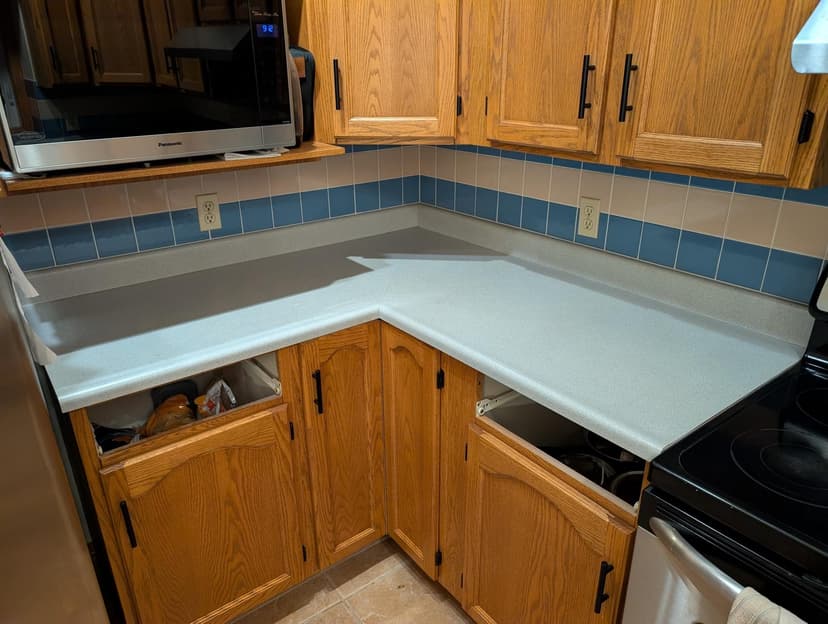 upgrade kitchen counters, backsplash, sink, and hardware