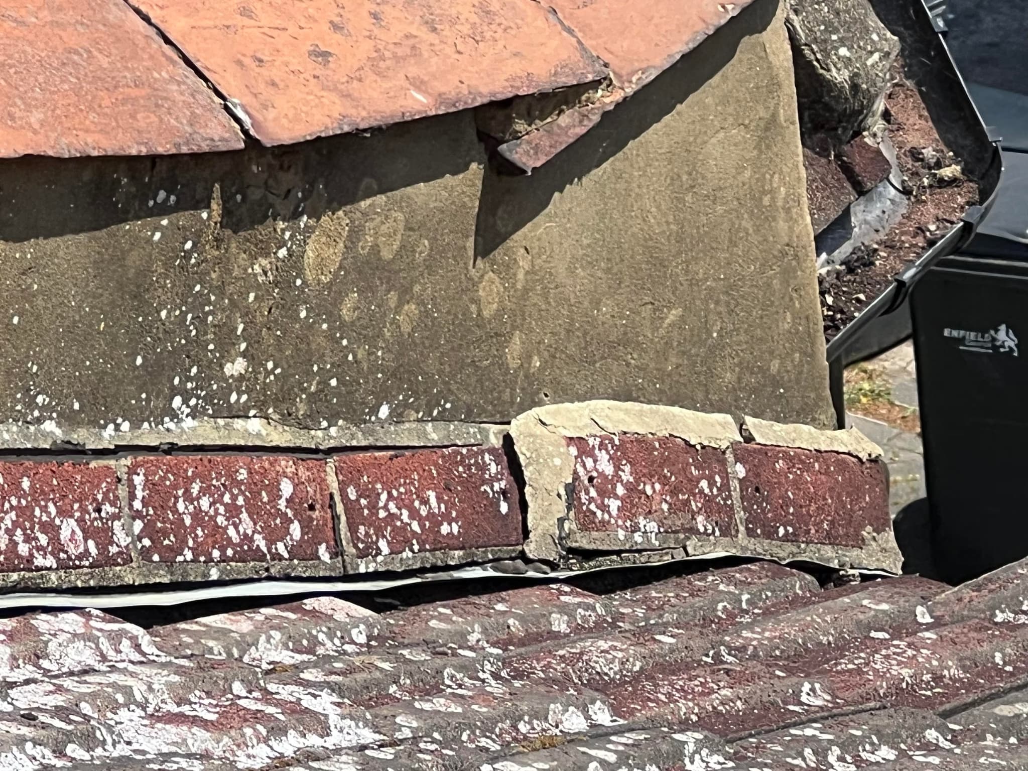 repair flashing between roof and dividing walls