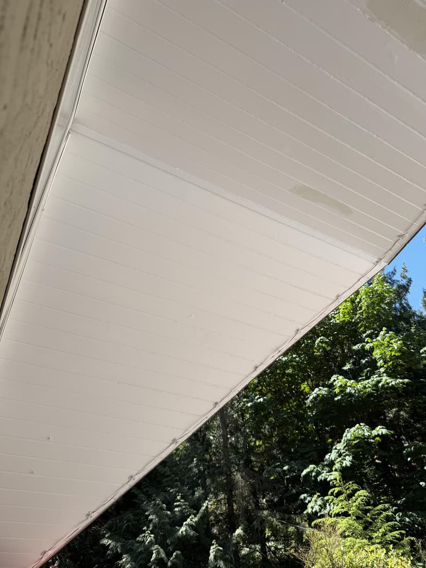 sand, fill, caulk, and repaint a soffit section