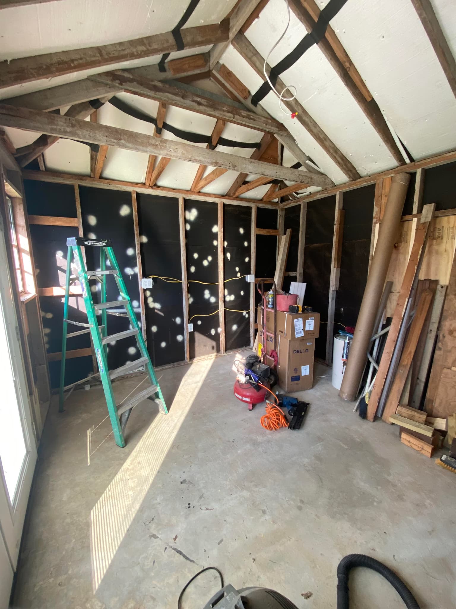 install open cell spray foam in a small shop