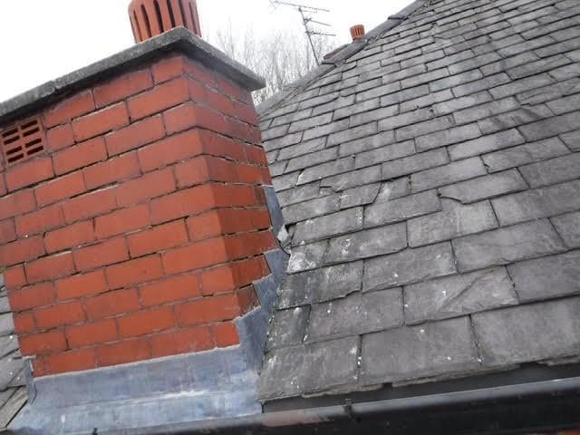 replace both chimney flashings and repair damaged tiles