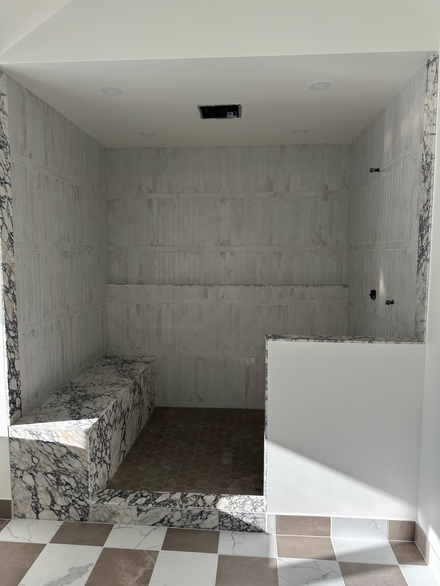 install a 3-panel custom glass shower enclosure with a hinged door