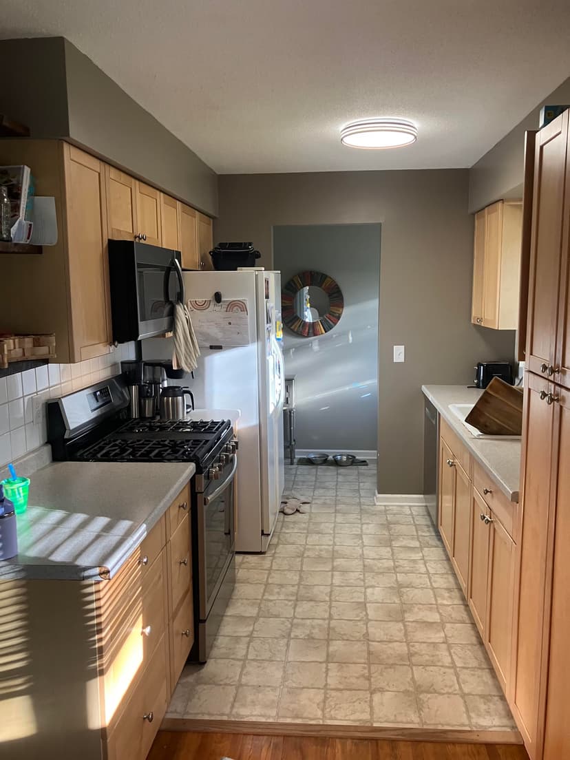 replace laminate counters and tile with granite and new tile, and install an undermount sink