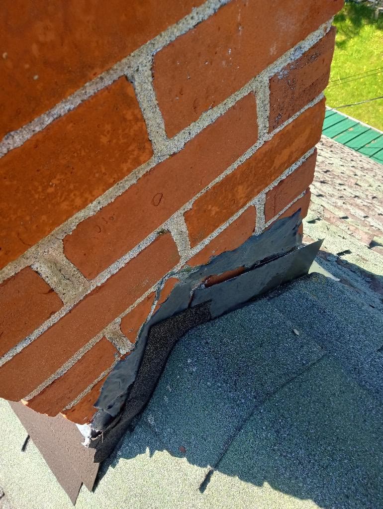 add flashing to two chimneys