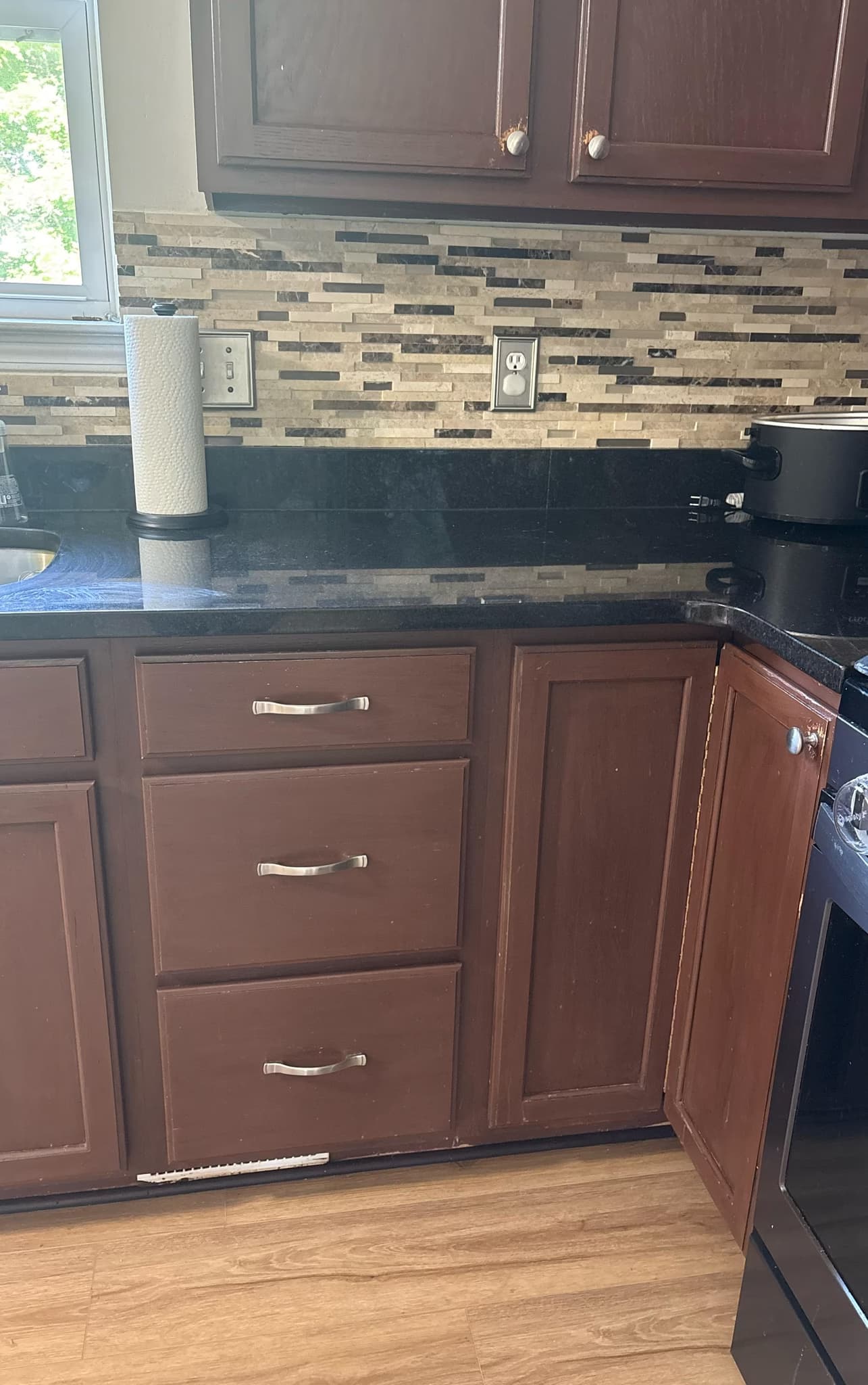 professionally repaint kitchen cabinets