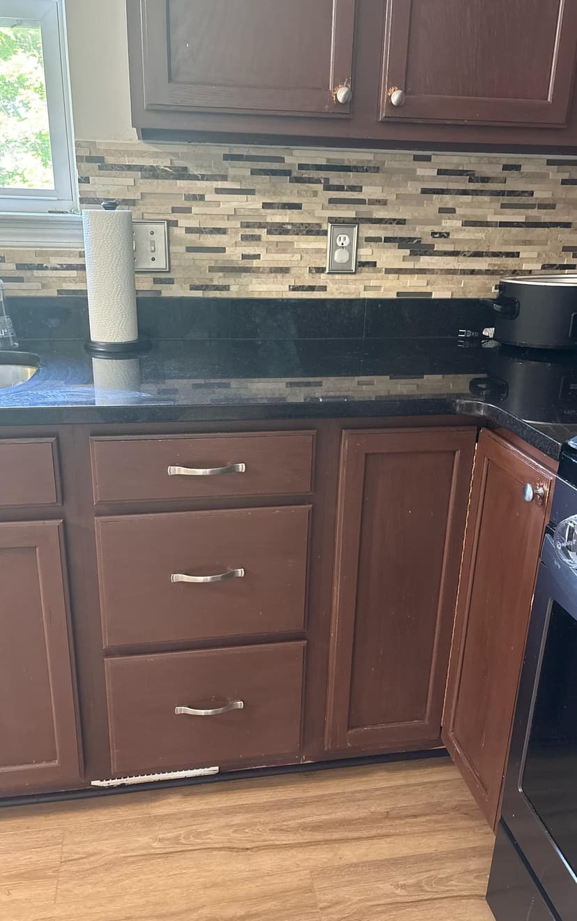 professionally repaint kitchen cabinets