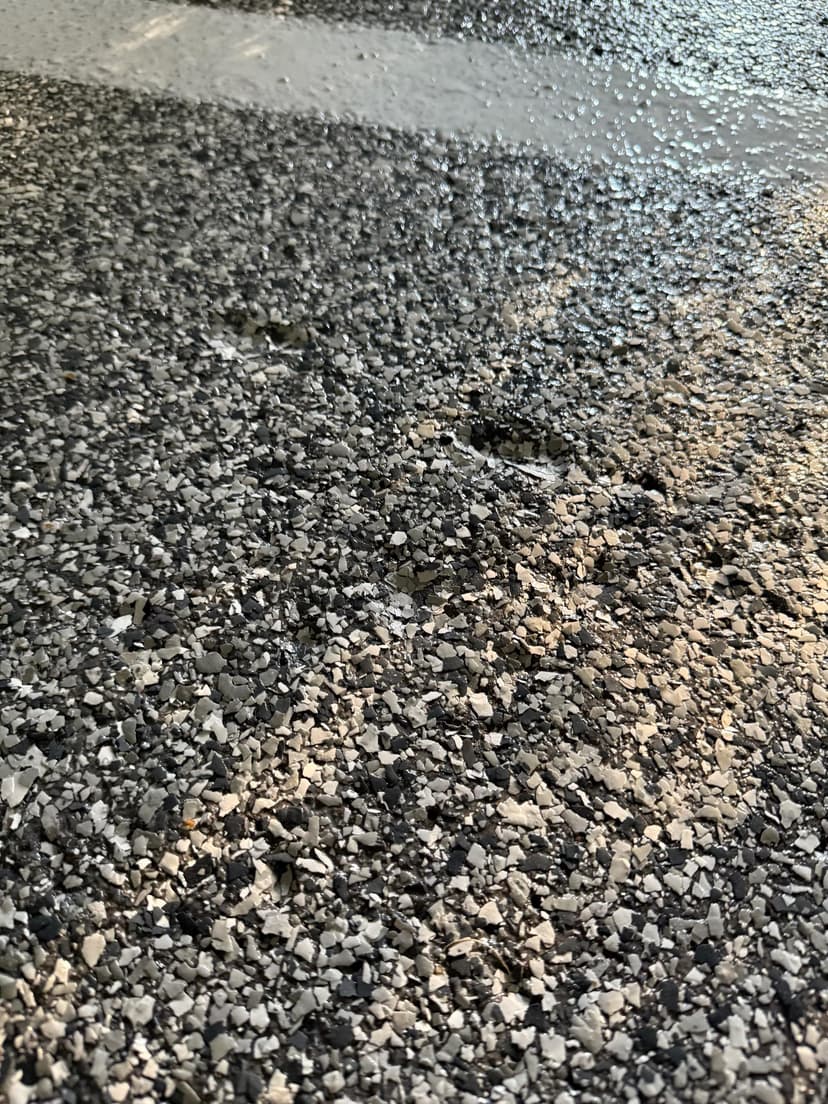 install epoxy flake system on a 2-car garage floor