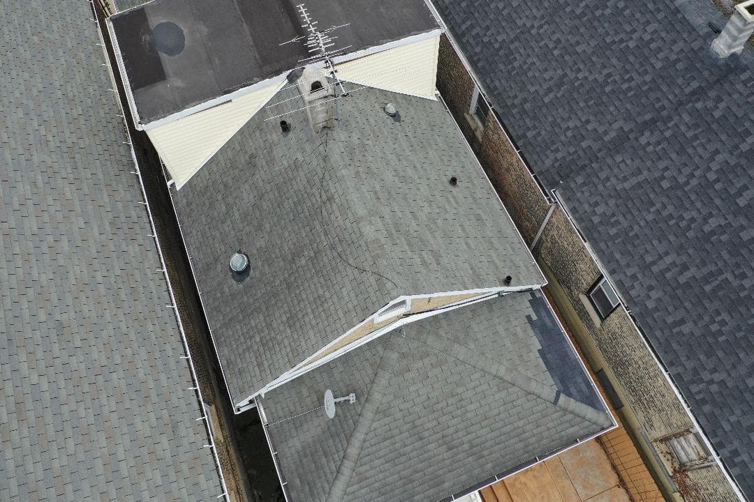 tear off and replace shingles on house and front entrance