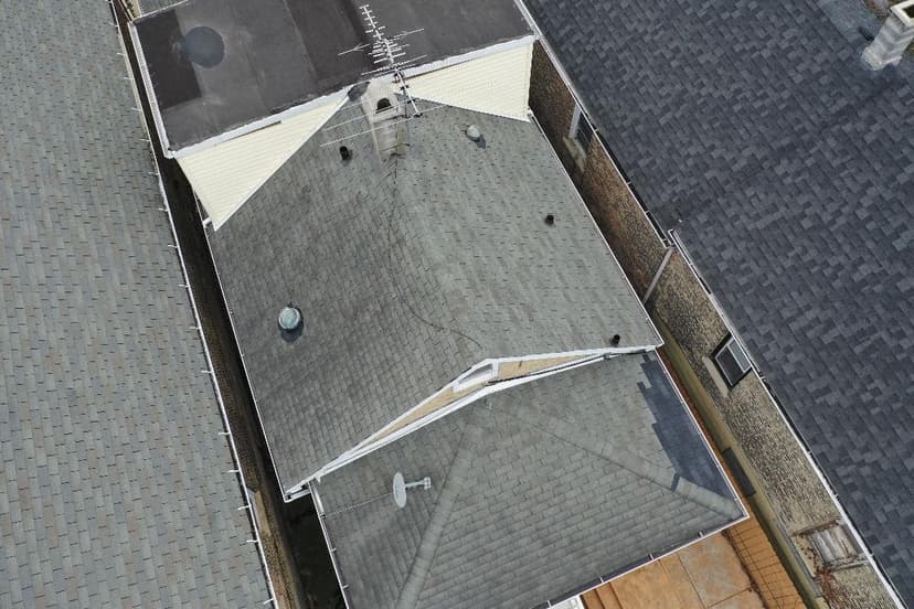 tear off and replace shingles on house and front entrance