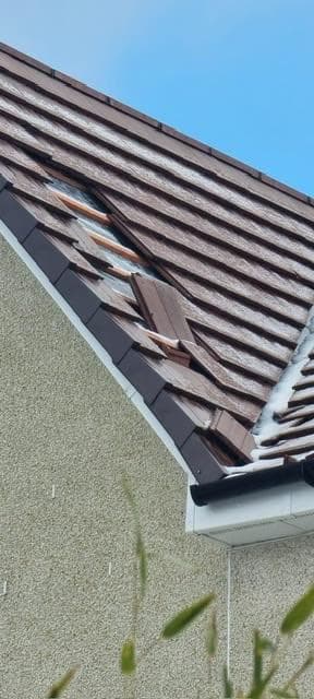 fix slipping tiles on a roof panel