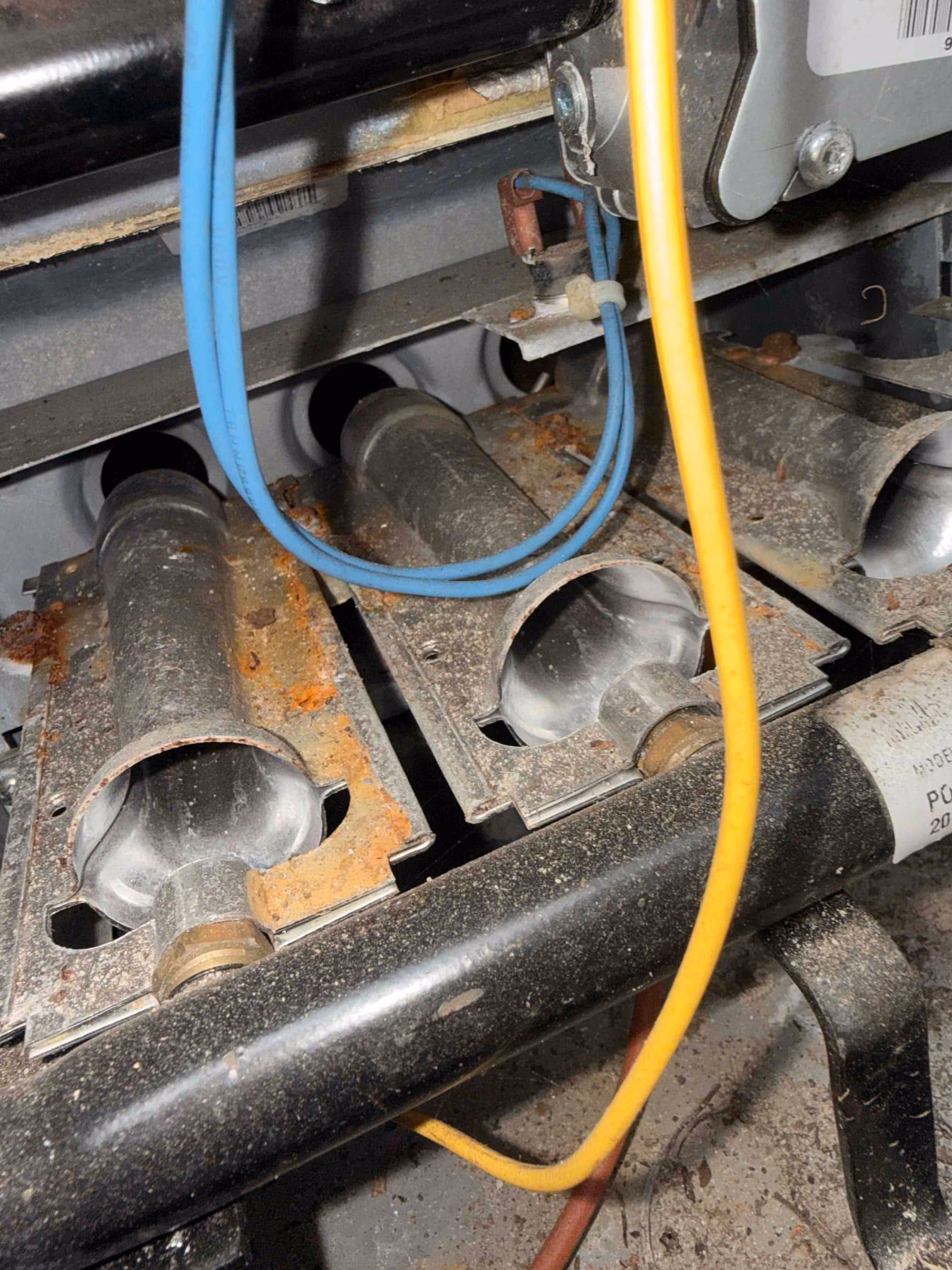 clean rusty burners on my gas pack