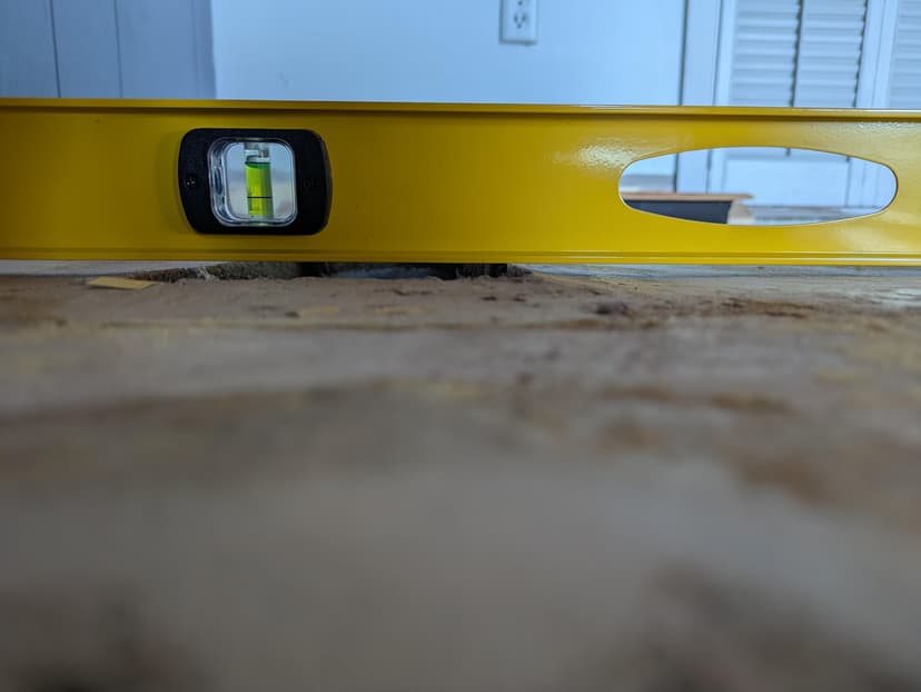 prepare concrete slab and install LVP flooring