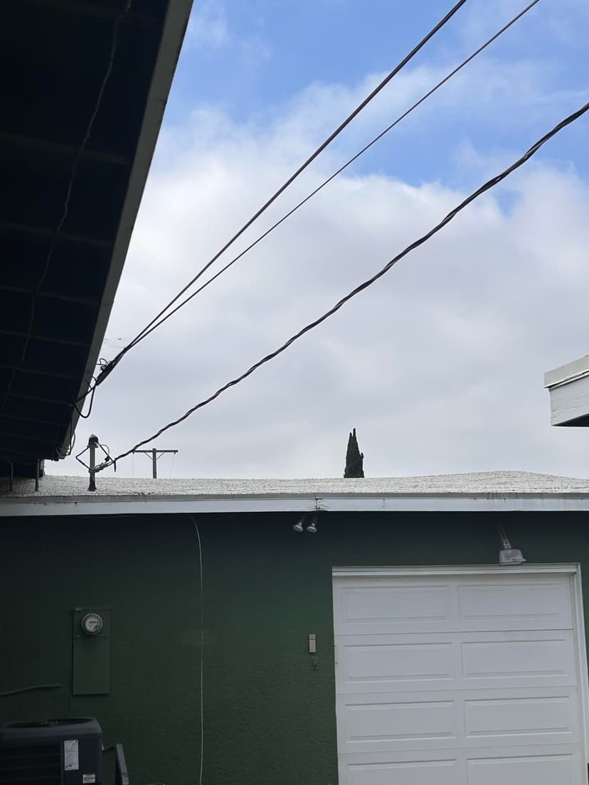 replace 35 squares of tar and gravel roof with shingles and build up sagging ridge