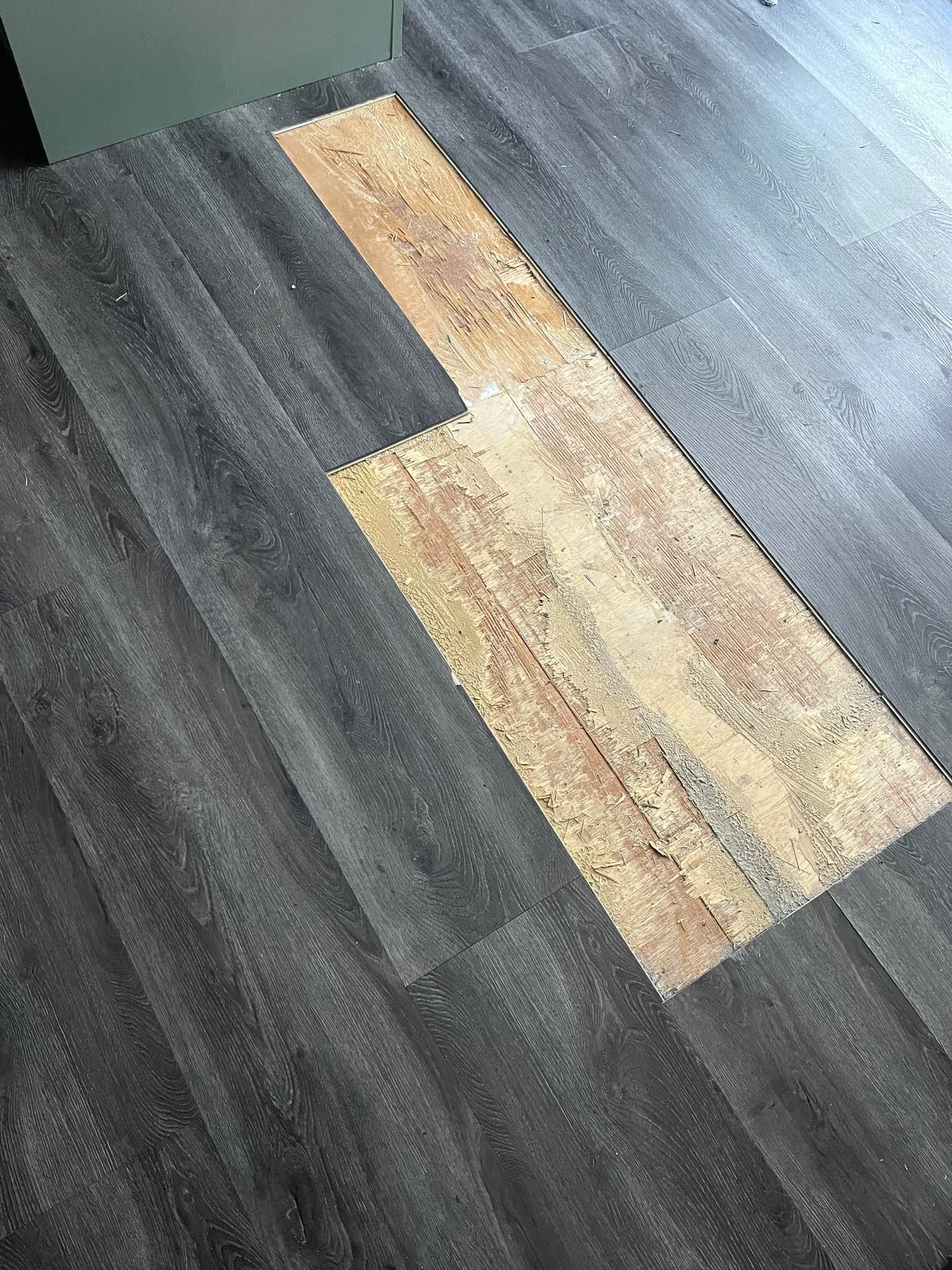 remove current glued-down click vinyl floor and replace ply