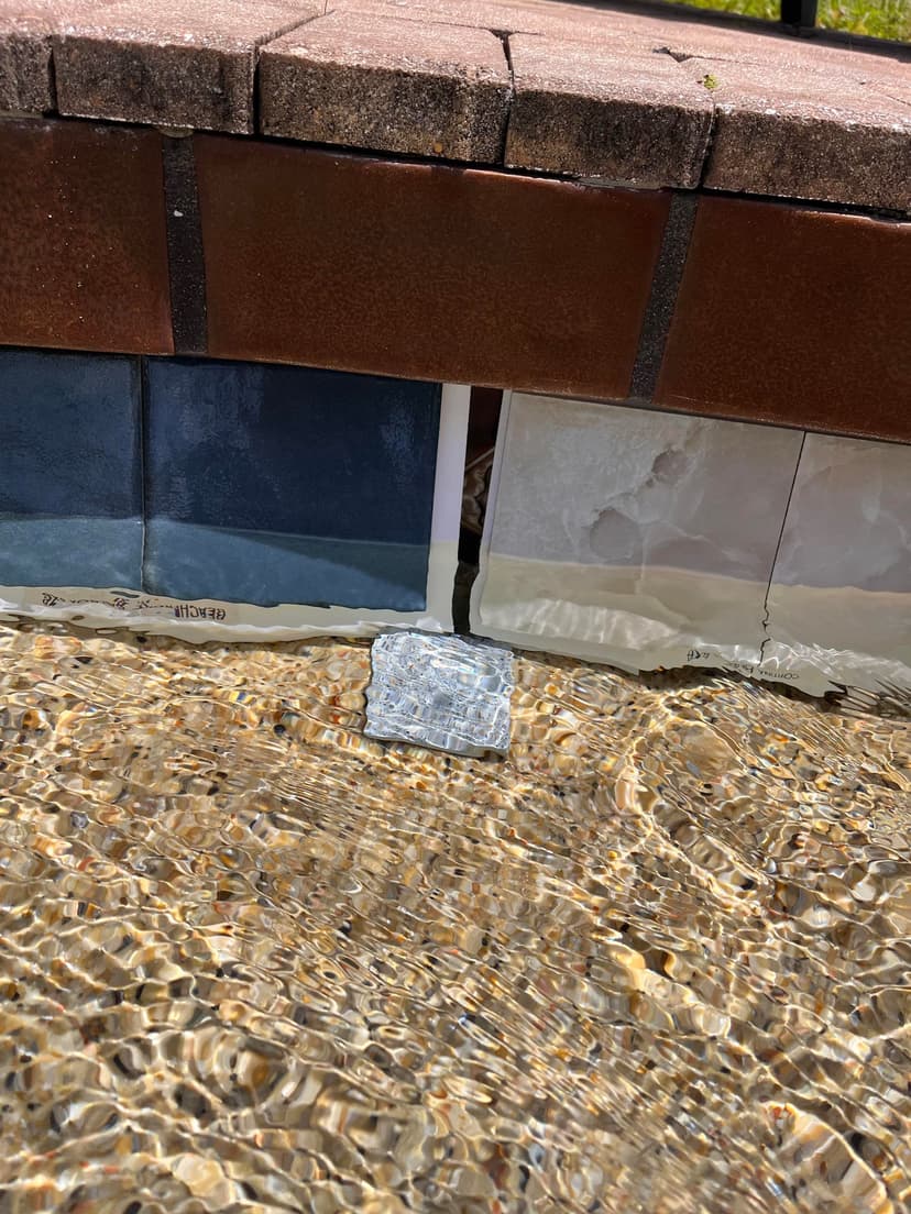 resurface pool with pebble finish and install waterline tile