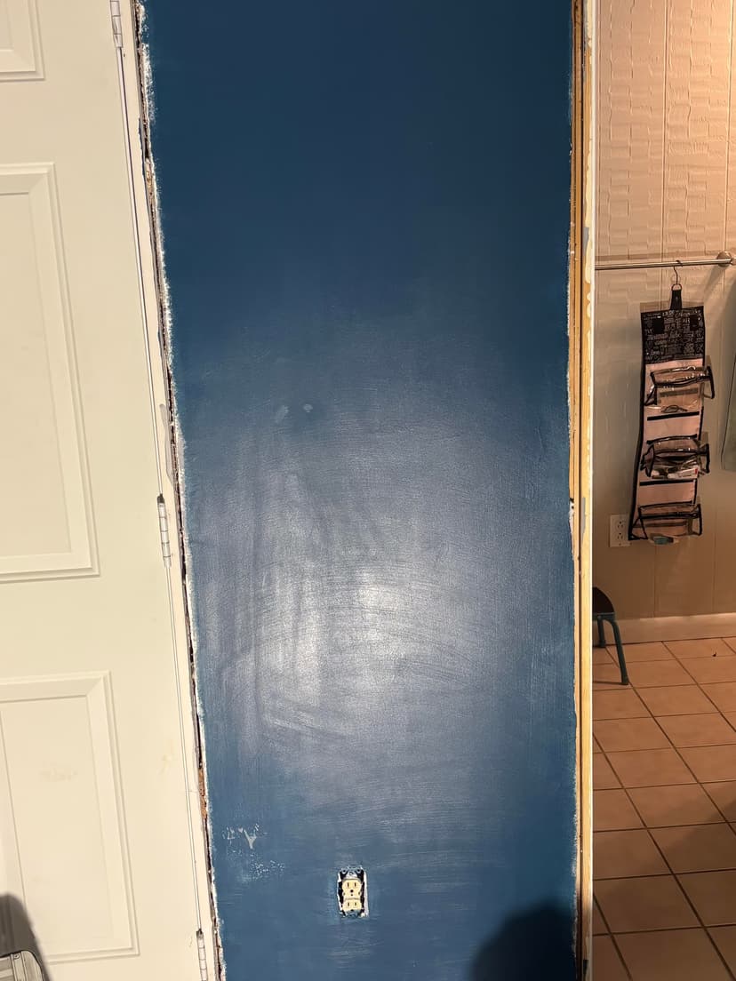 resurface 50 sqft of peeled drywall