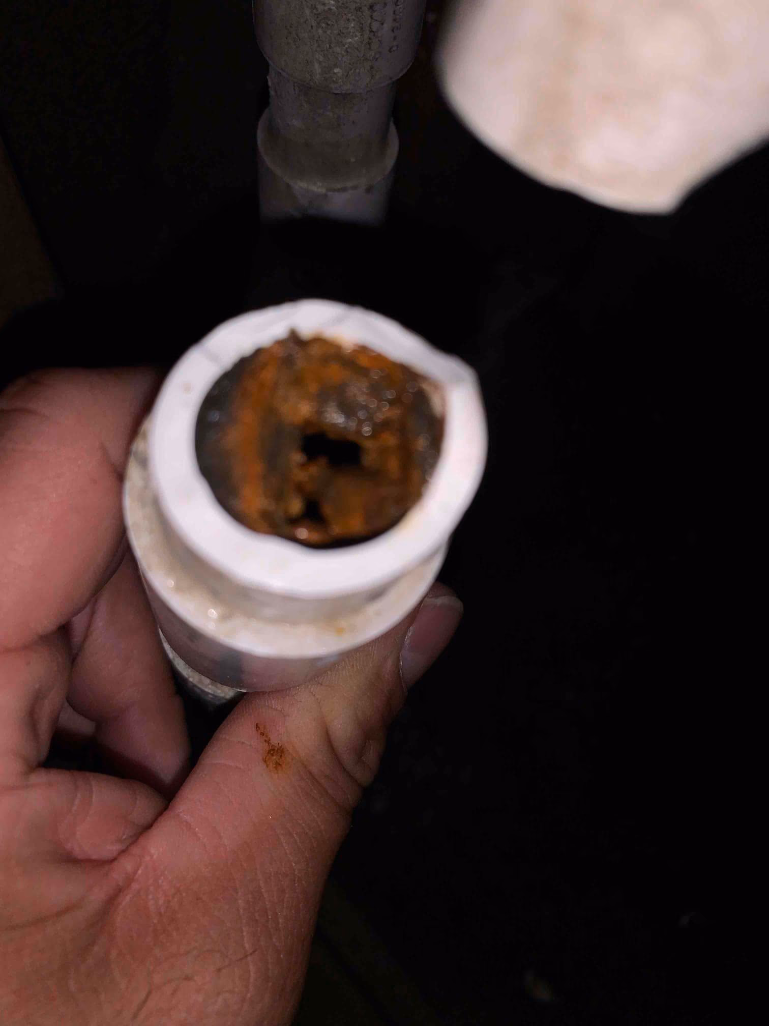 clean and repair AC unit drain pipe