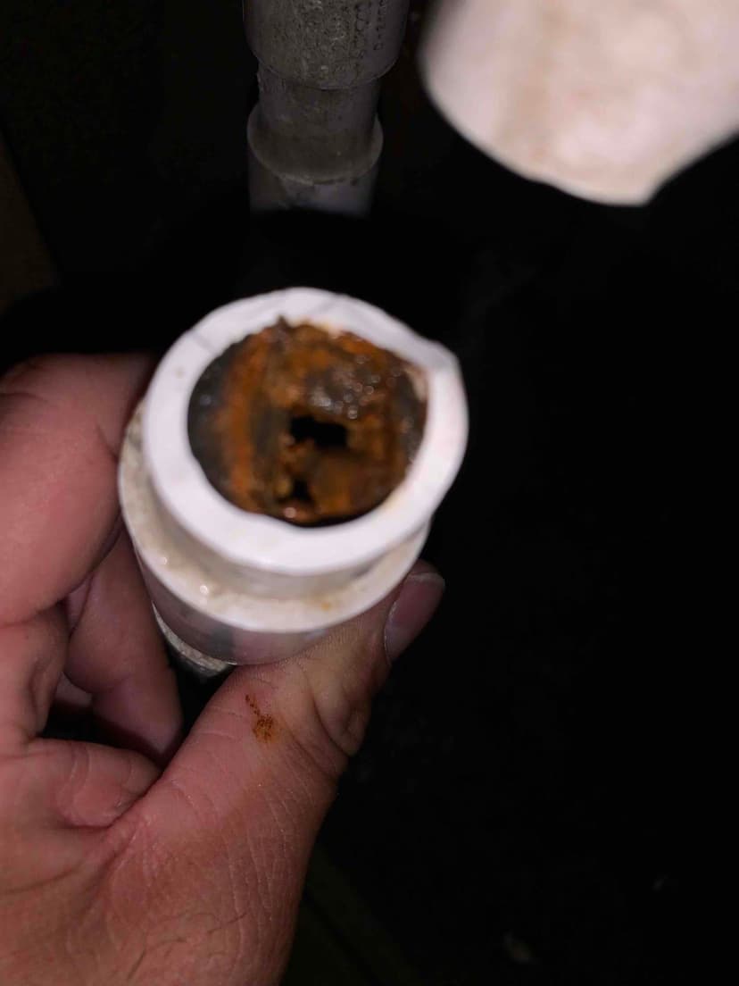 clean and repair AC unit drain pipe
