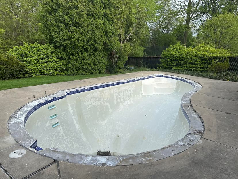 resurface pool with standard coping, tiles, and marcite