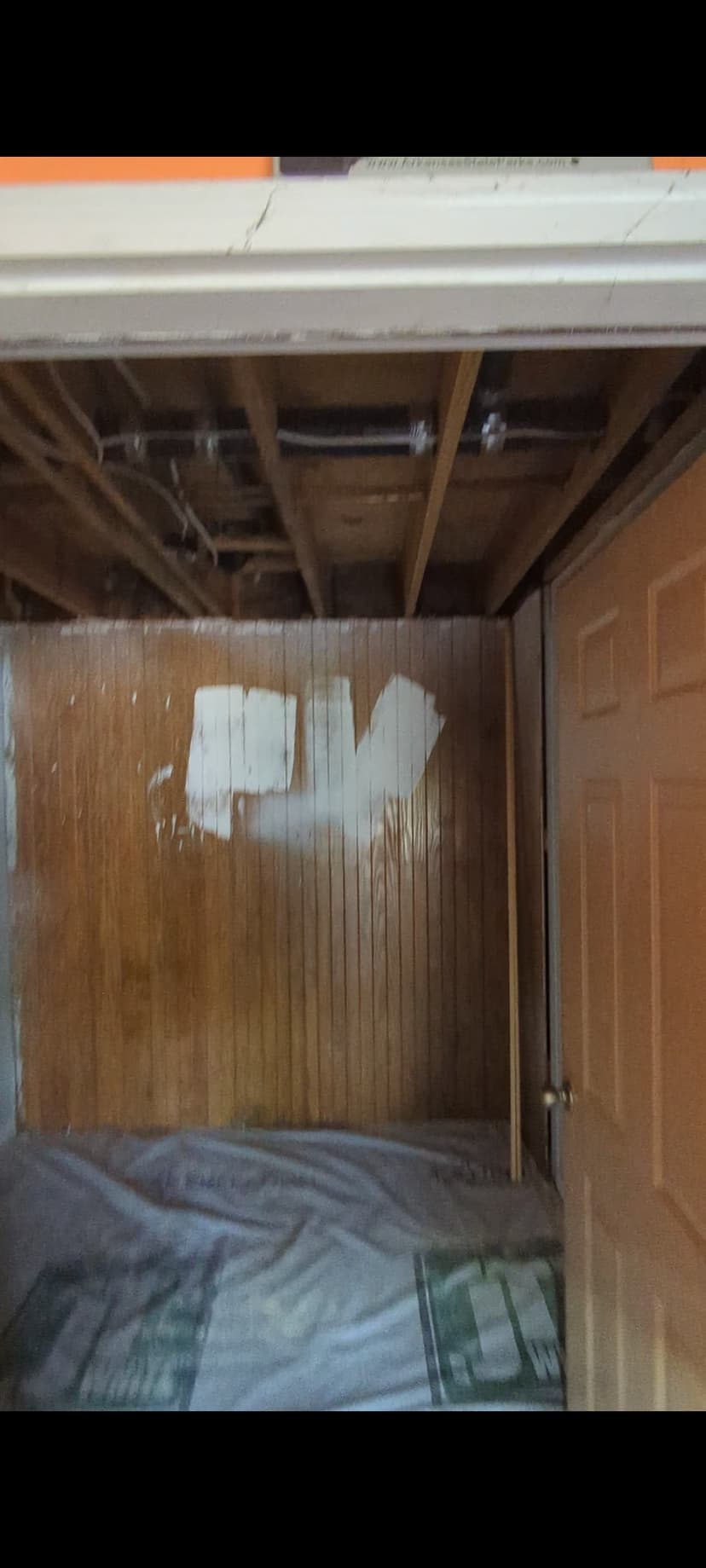 repair mudroom ceiling and wall damage from washer leak