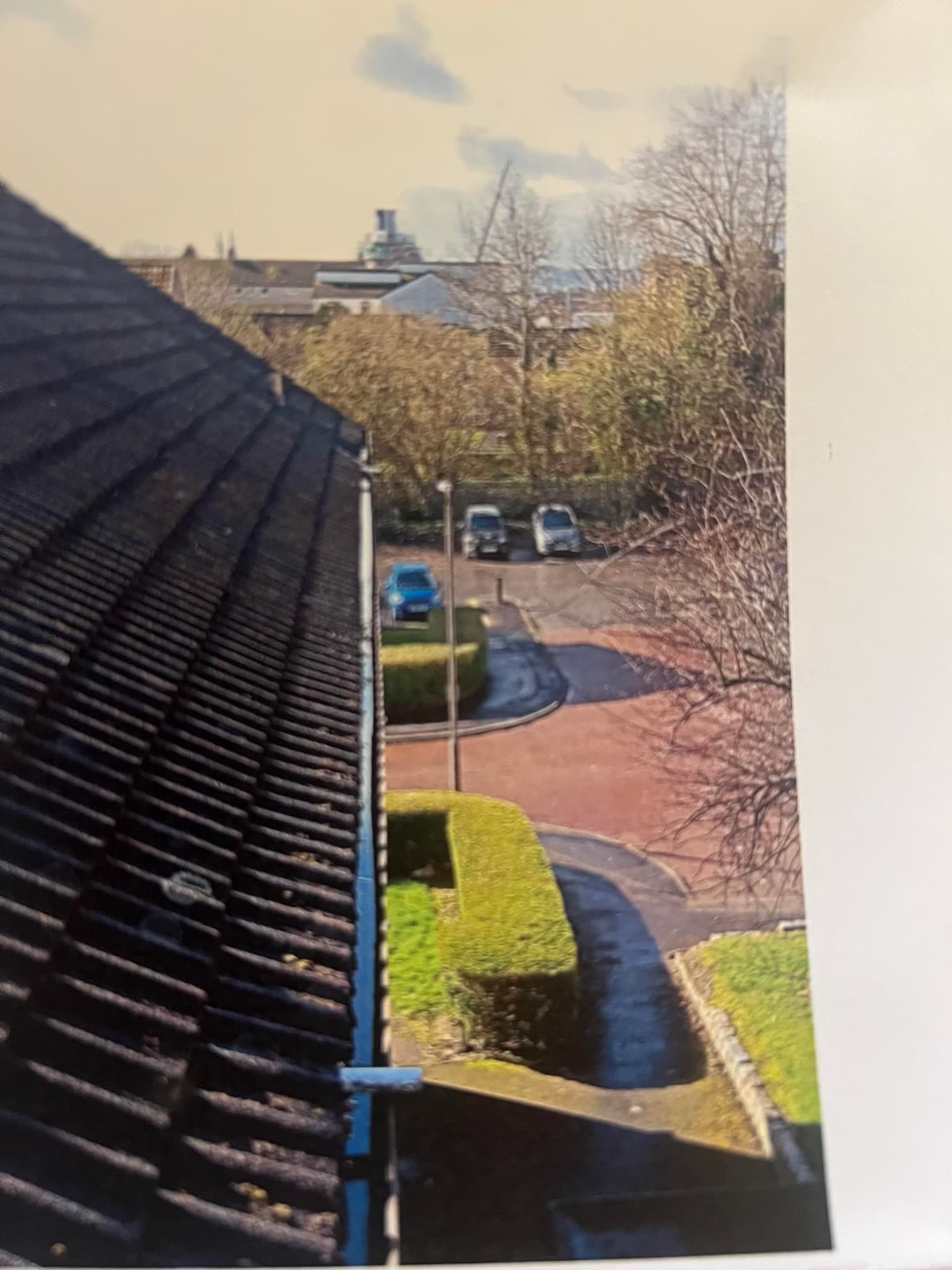 clean gutters on a communal building