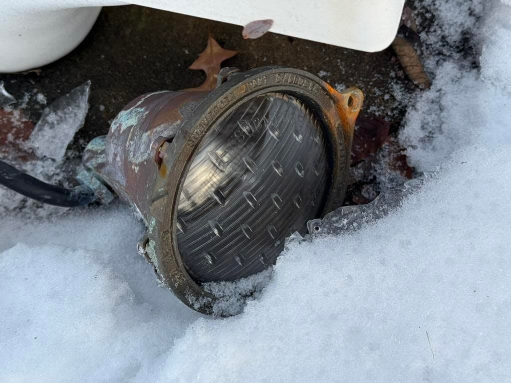 seal off the existing pool light housing with a plate