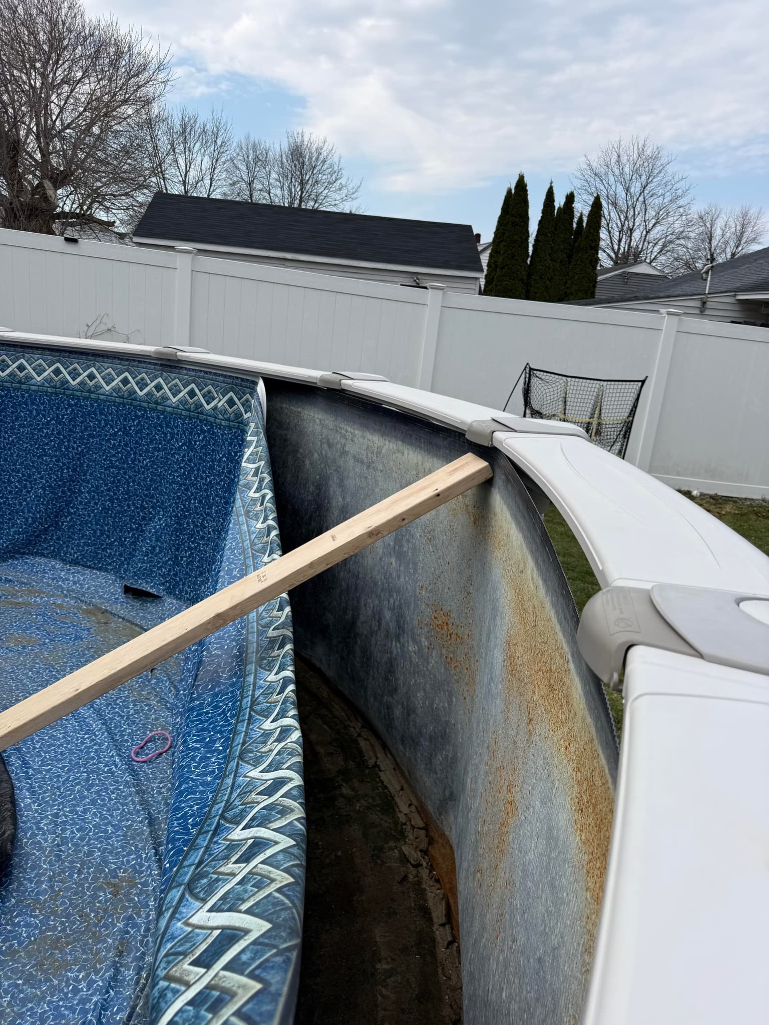 repair and rebuild pool walls and install owner-provided liner