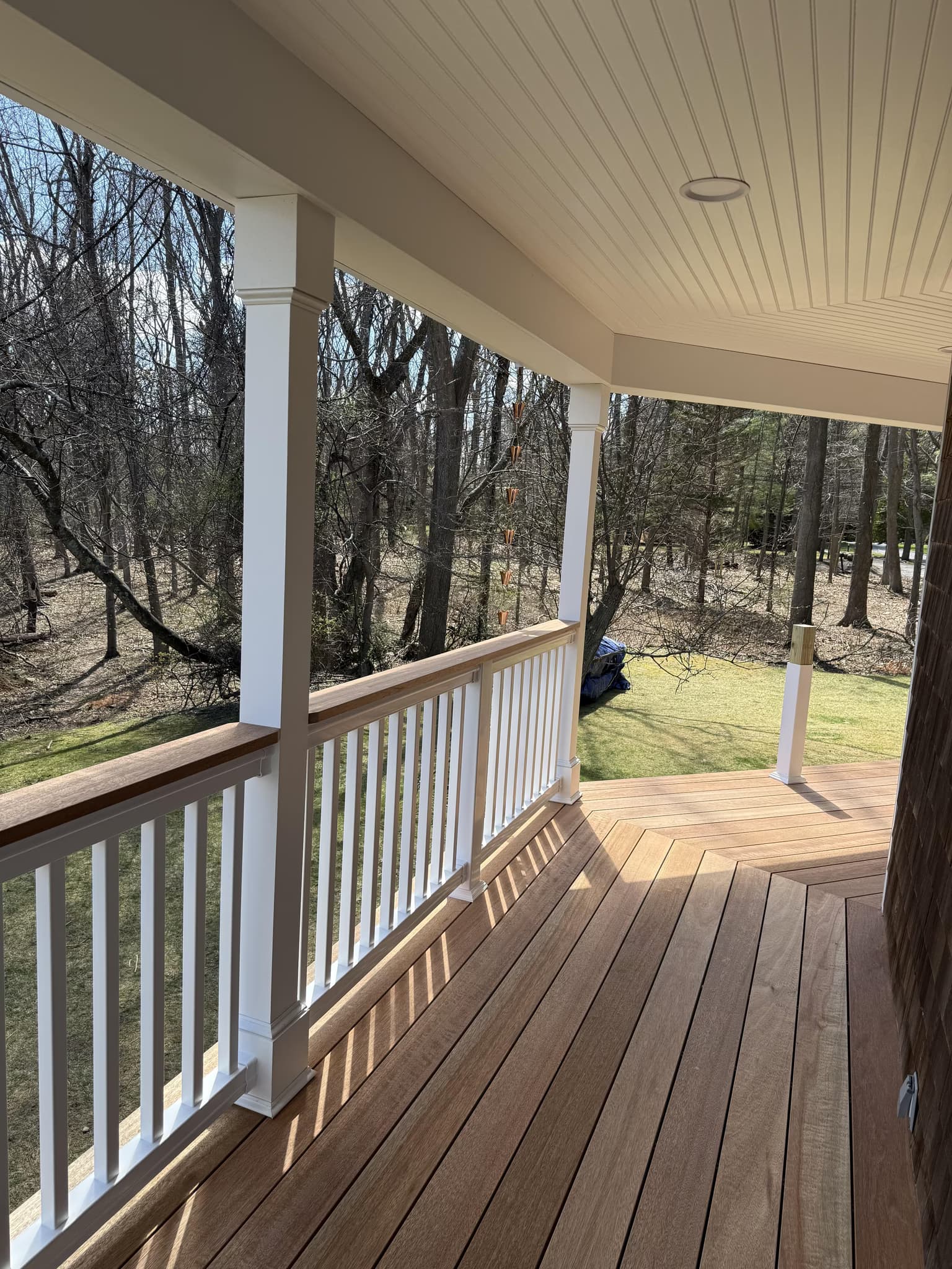stain a 250-300 sq ft mahogany porch and handrail