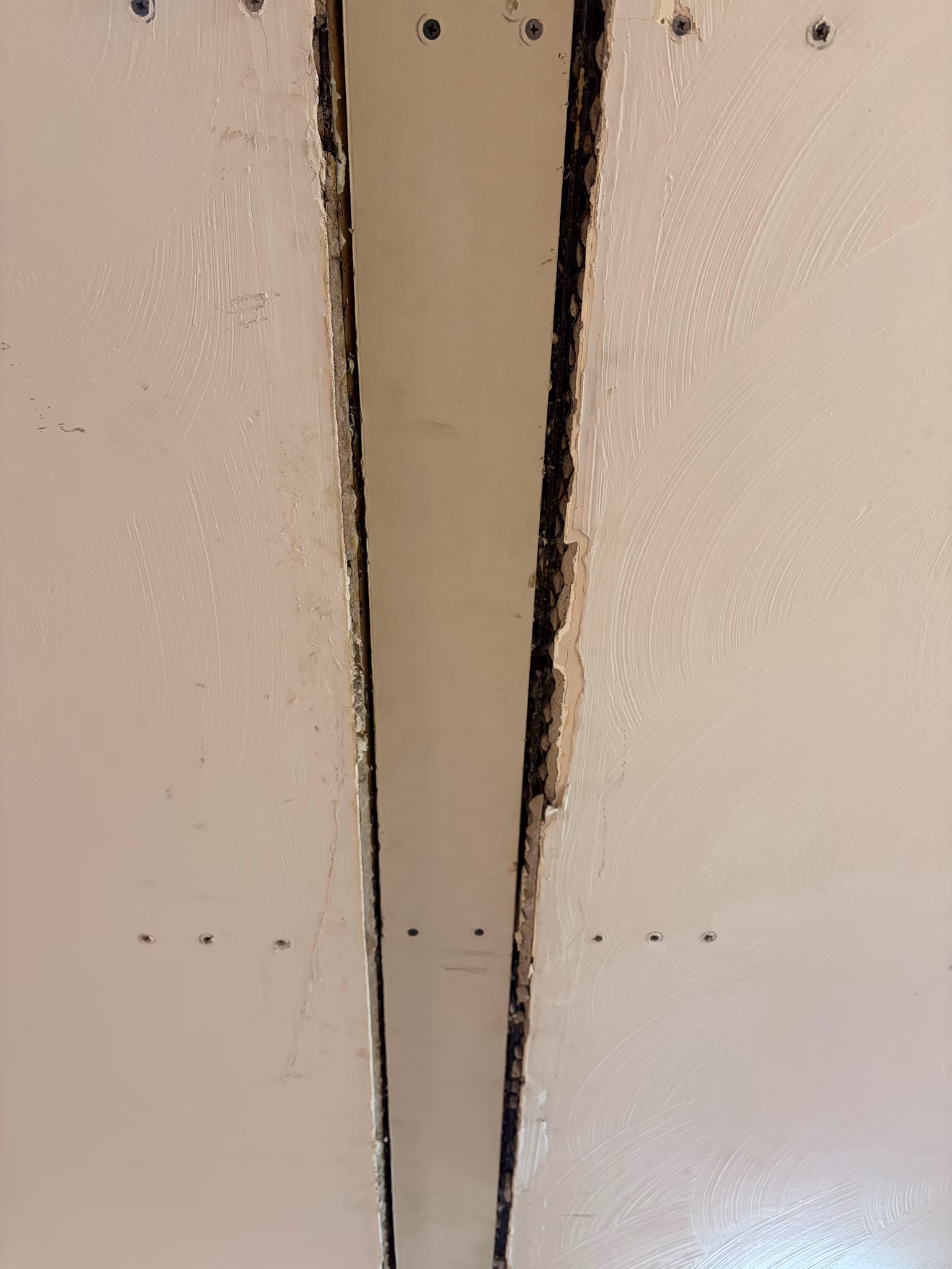 repair drywall and match ceiling swirl texture (low estimate)