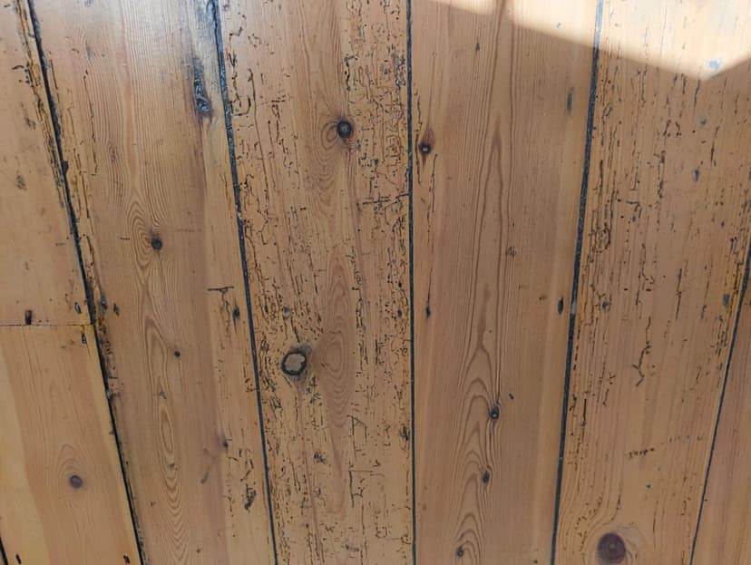 restore old pine floors throughout a two-story, two-bedroom house