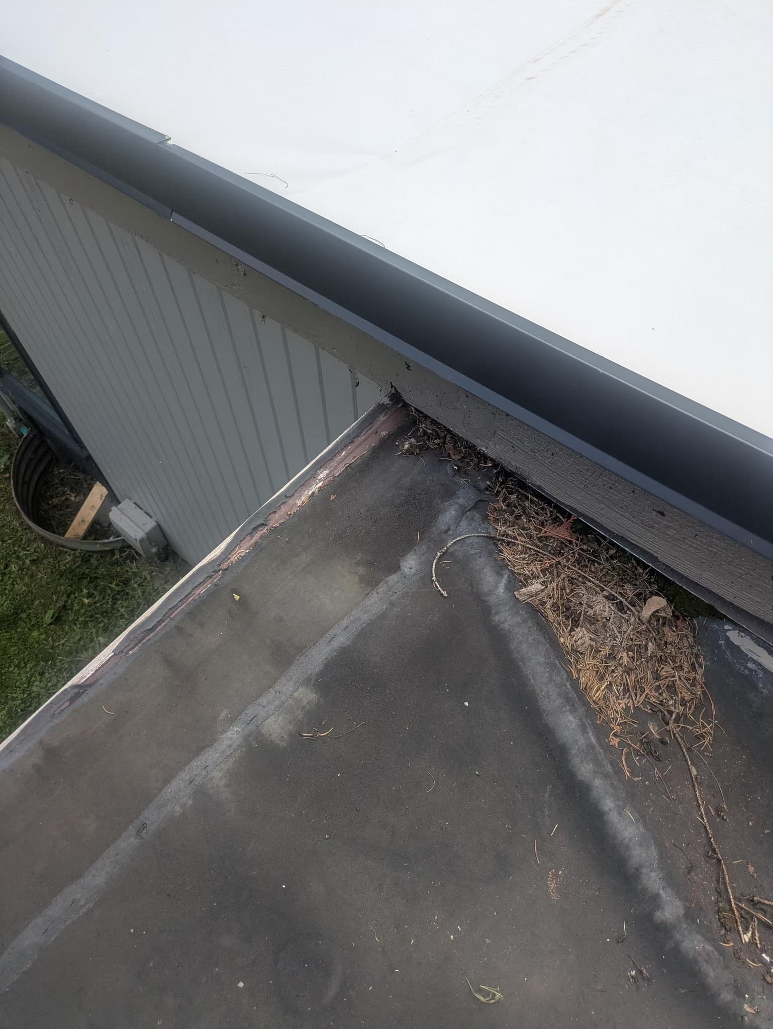 replace an 800 sqft EPDM flat garage roof