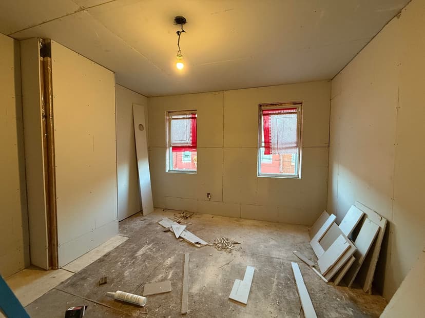 tape and mud drywall in two bedrooms and living room