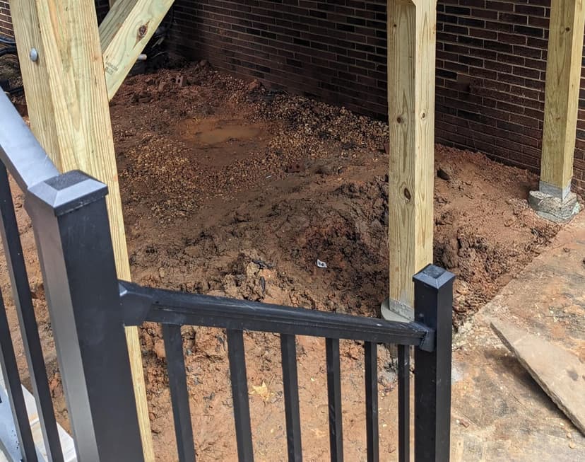 pour concrete to level ground under deck