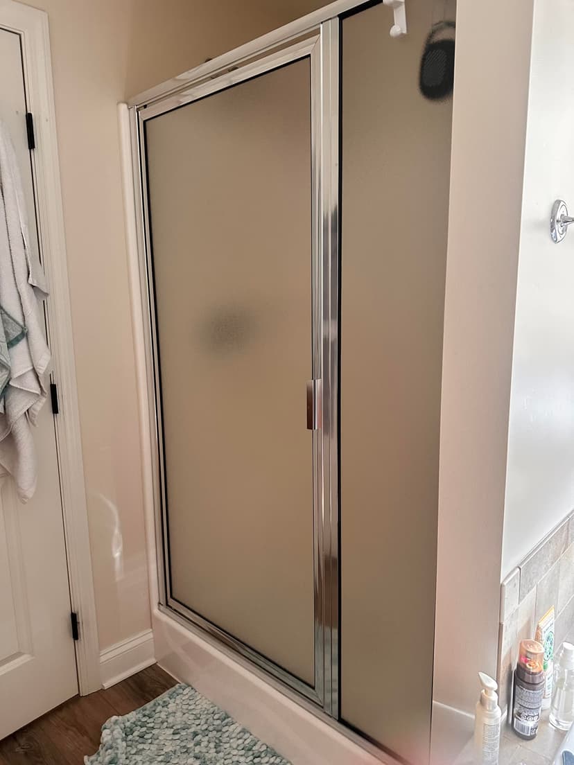 install a new shower door, fixed panel, and knee wall panel