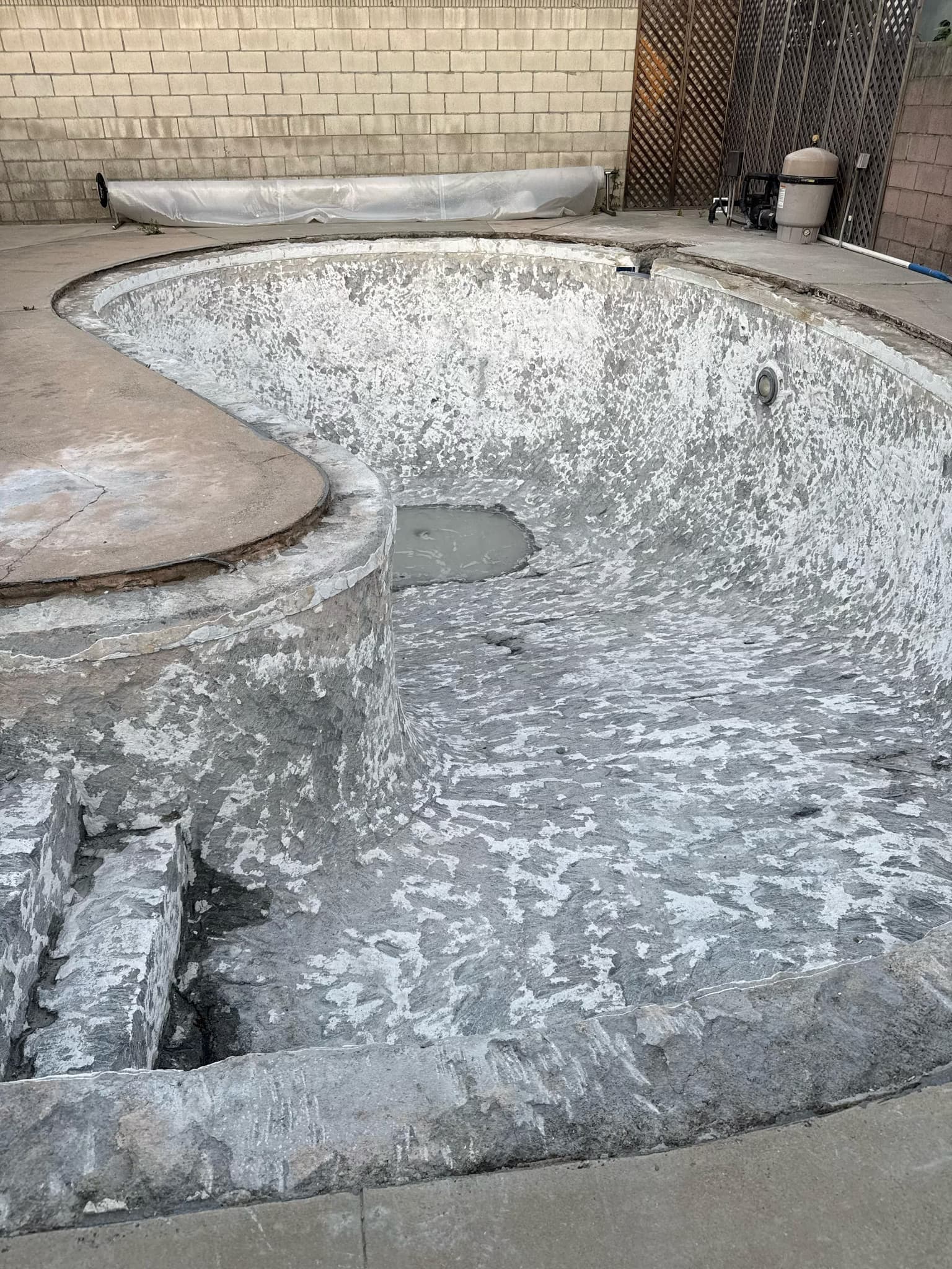 fix exposed rebar and cracks in pool