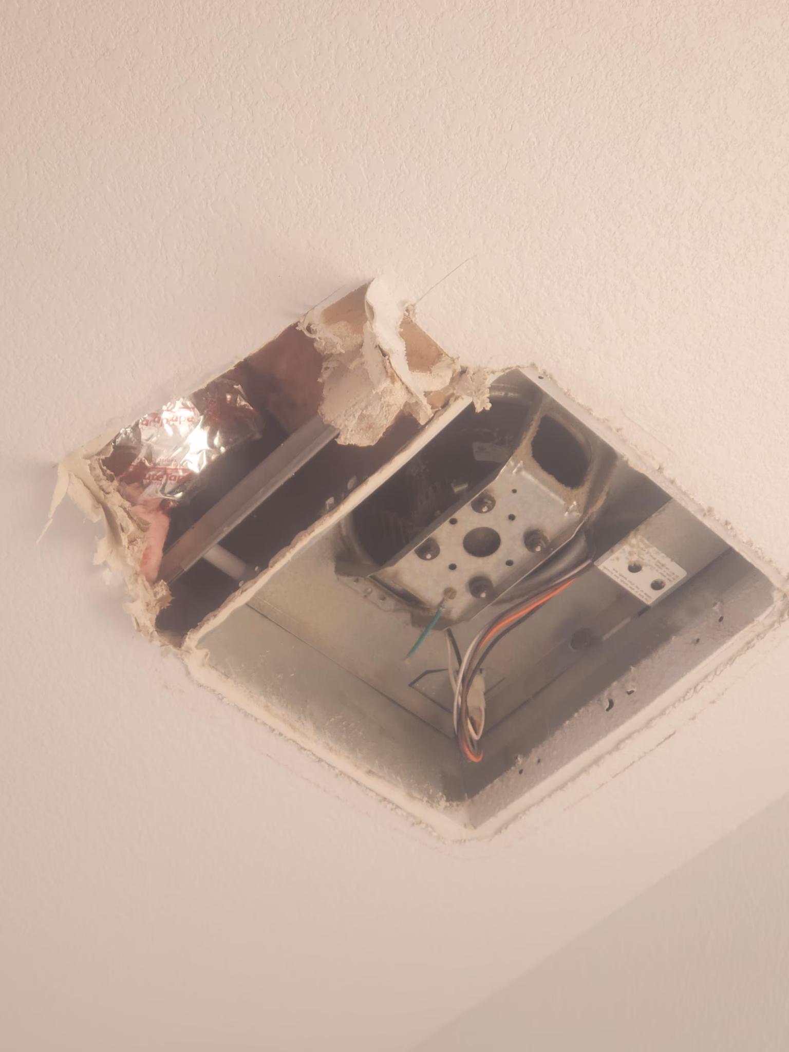 clean out the bathroom fan vent